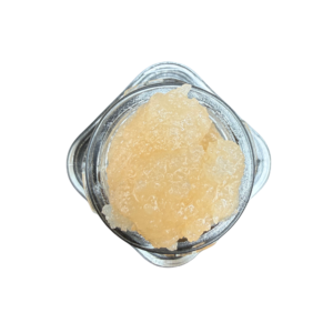 “Peach Panther Extracts Grapefruit Romulan cured resin concentrate in a clear 1 ounce container featuring light yellow and golden cured resin with a smooth textured appearance.”