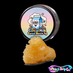 Whip & Drip Co. Cereal Milk cured resin concentrate with pale golden extract displayed beside colourful cereal-themed 1 gram product packaging on a black background.